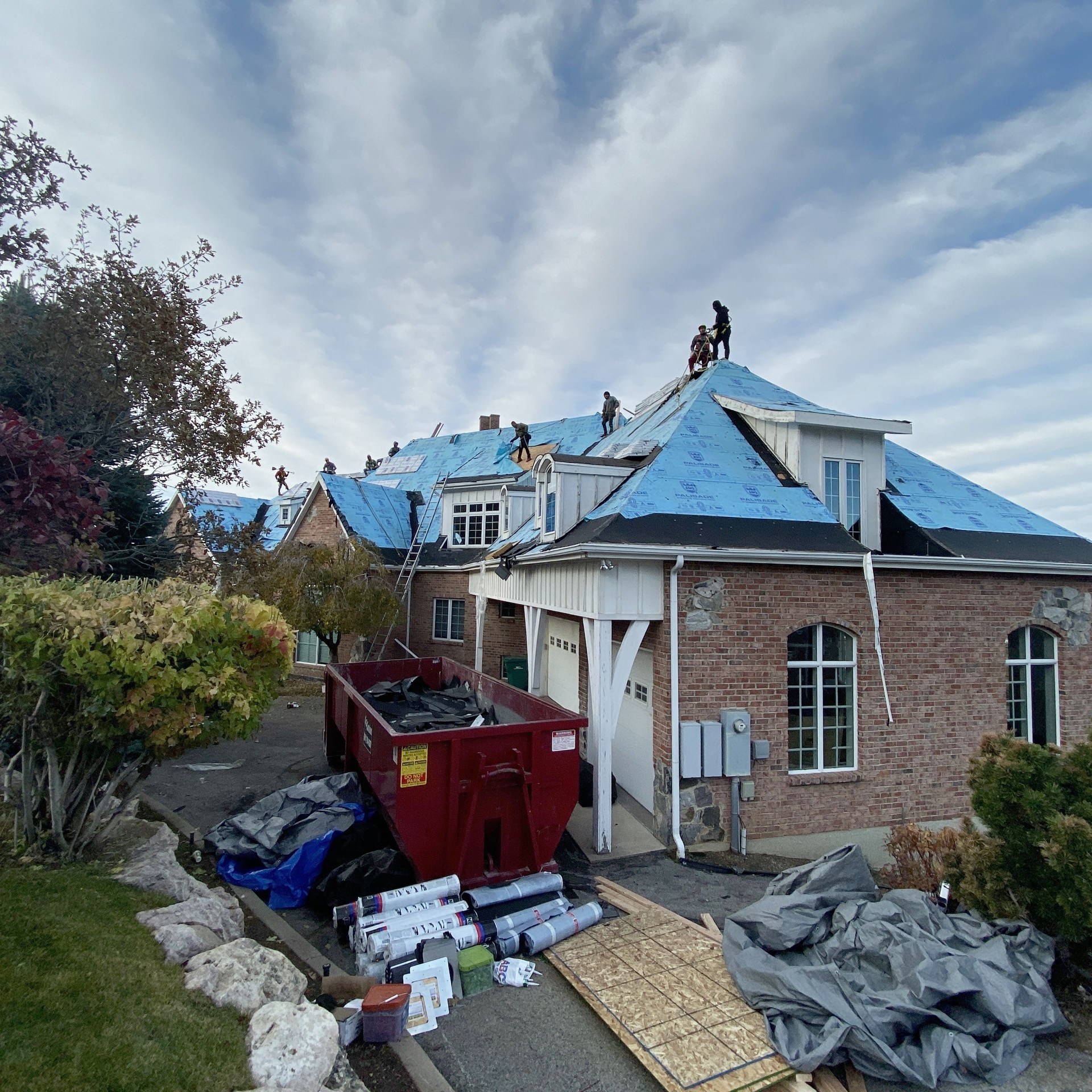 Residential roof re-roofing project in progress